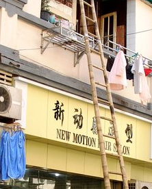 Stuck Between A Dude On A Ladder & A Hard Place